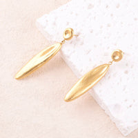 Boucles d'oreilles Thalassa dorées - Silhouette fluide brossée & acier inoxydable - Hersée Hersée Hersée Paris 9