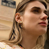 Boucles d'oreilles Dachtylídia à puce dorées Hersée Hersée Paris 9